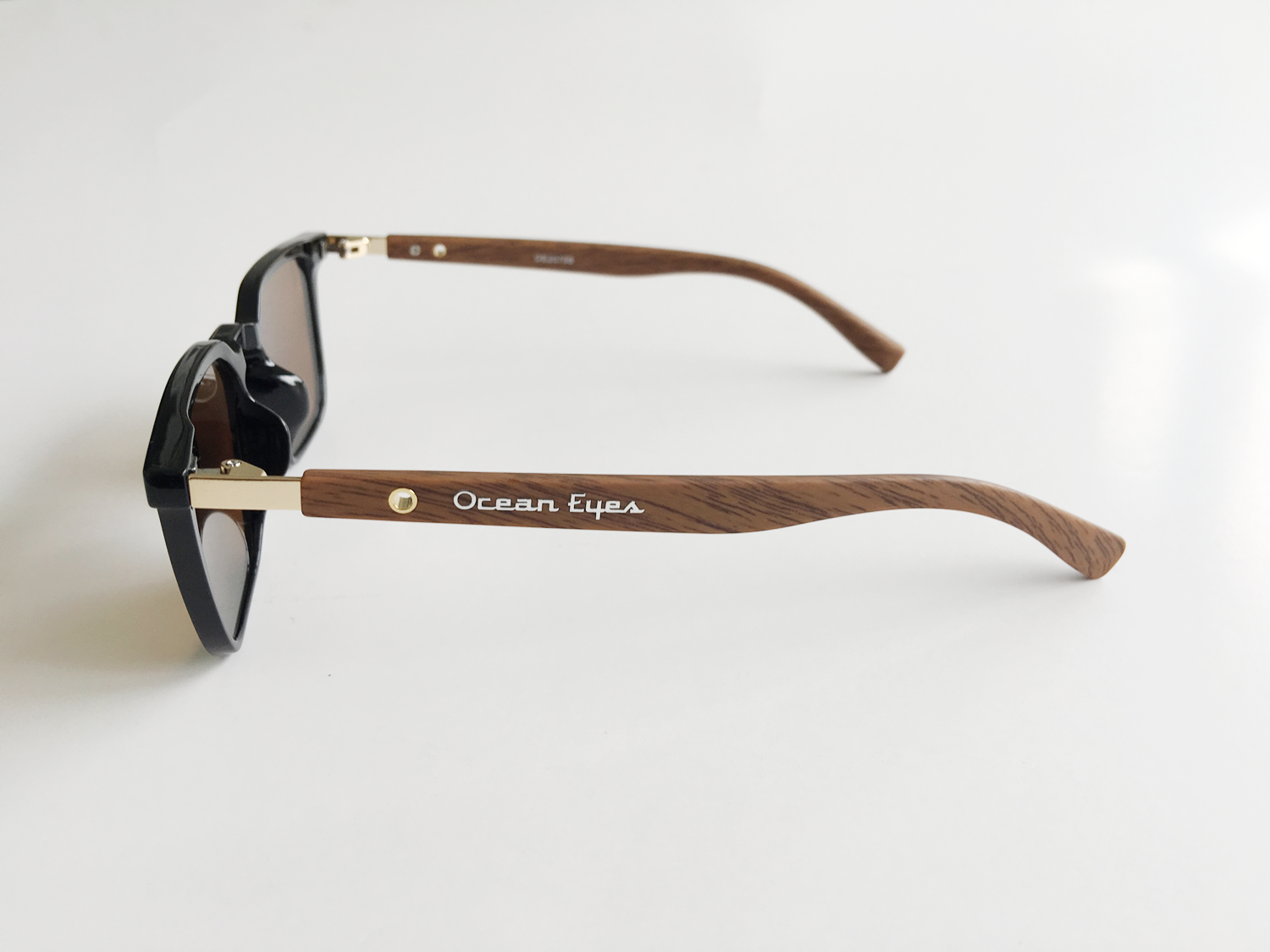 Panama PC -Shiny Black and Woodgrain Frame-Amber Lenses